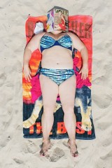 nyamannya-berjemur-dibawah-matahari